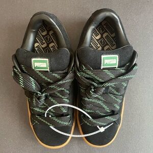 Puma Kids Black Sneakers with Green Highlights